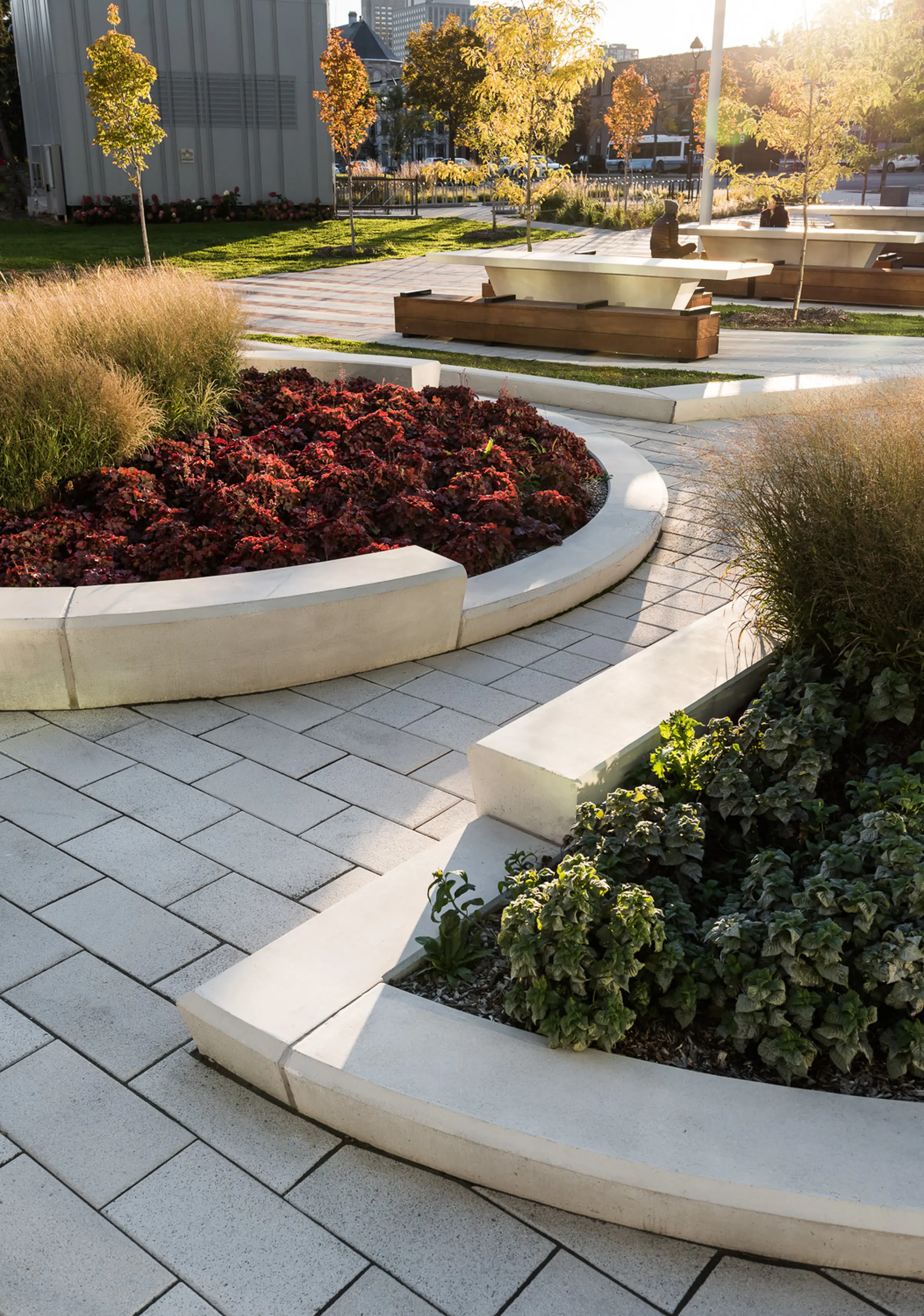 Flowerbeds doubly serve as seating